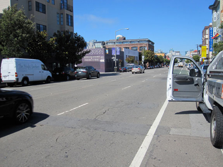 parked cars and bicycle lanes don’t mix